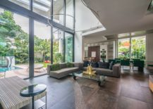 Open-and-spacious-living-area-on-the-lower-level-connected-with-the-outdoors-and-the-pool-217x155