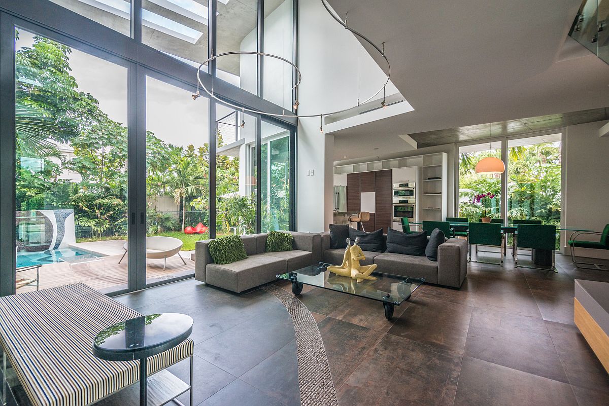 Open and spacious living area on the lower level connected with the outdoors and the pool