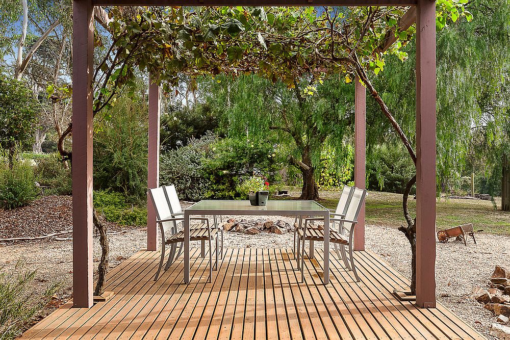 Pergola structure and outdoor dining space at the Bower House