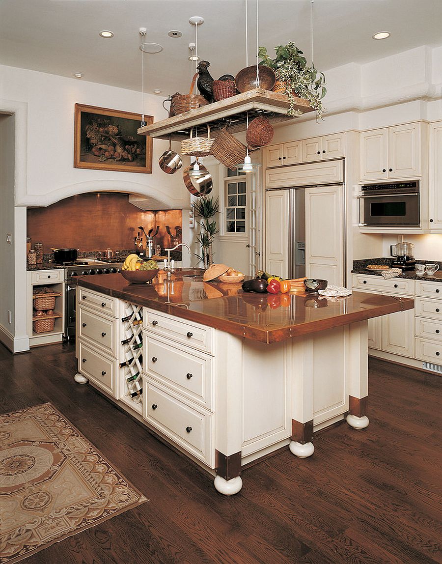 Polished copper countertop for the unique modern kitchen island [Design: Kleppinger Design Group]