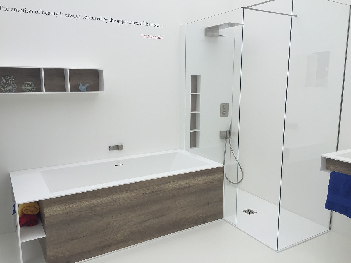 Shower and bathtub make perfect use of the corner space