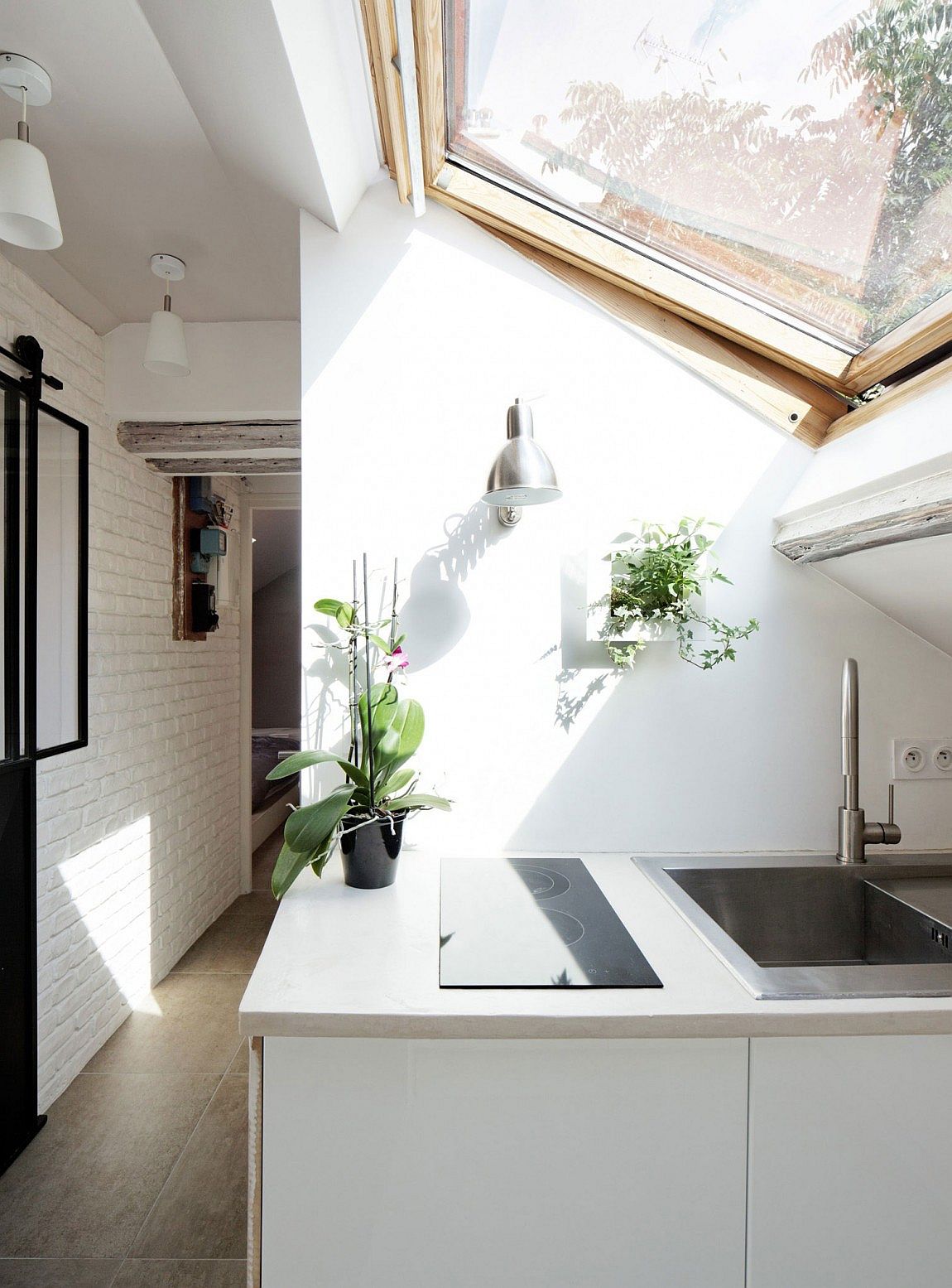 Skylight brings sunlight into the small kitchen