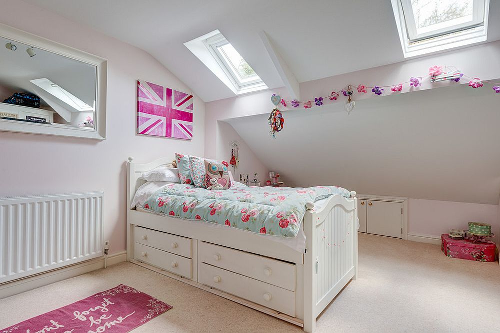 Small bed in the kids' bedroom offers ample storage space