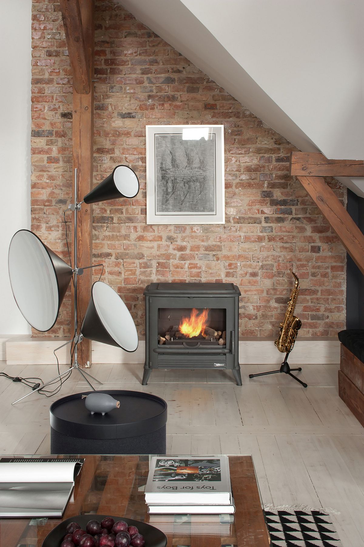 Small fireplace and roaring music system in the living room