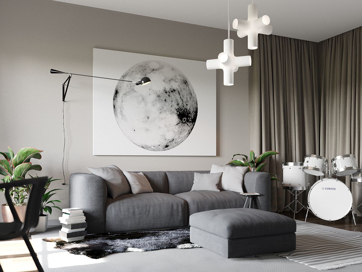 Smart sitting zone with plush couch and ottoman in gray and lovely wall art