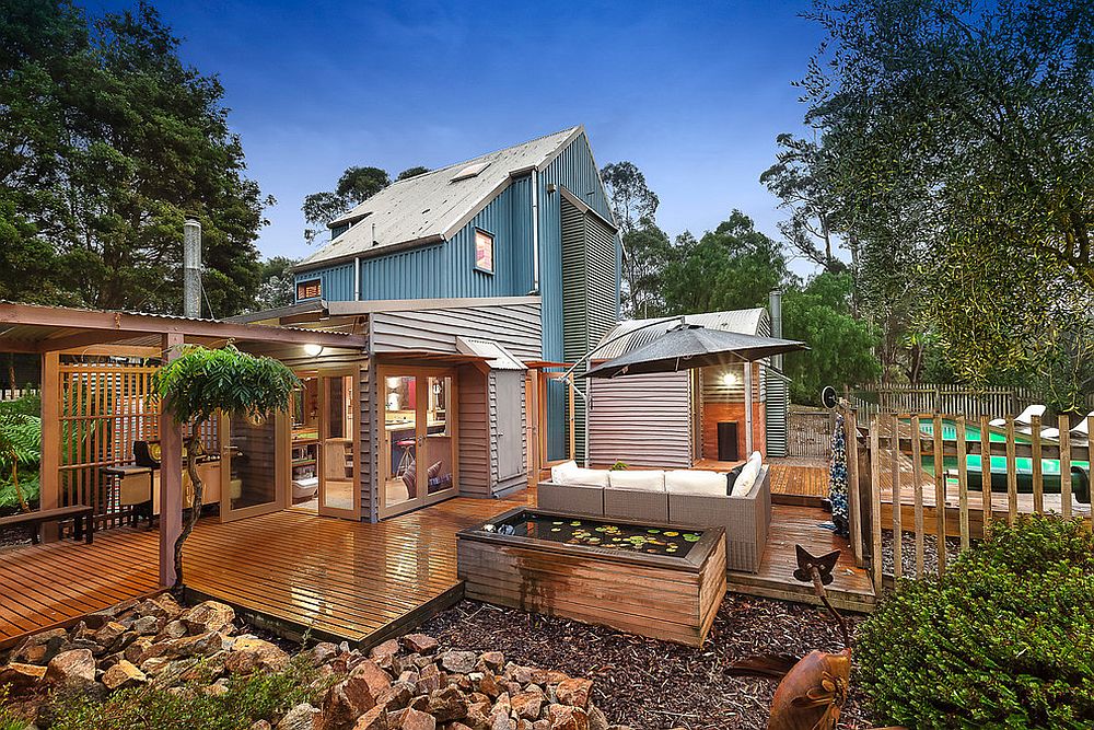 Spacious wooden deck, outdoor Jacuzzi and pool area of the Bower House in Shoreham