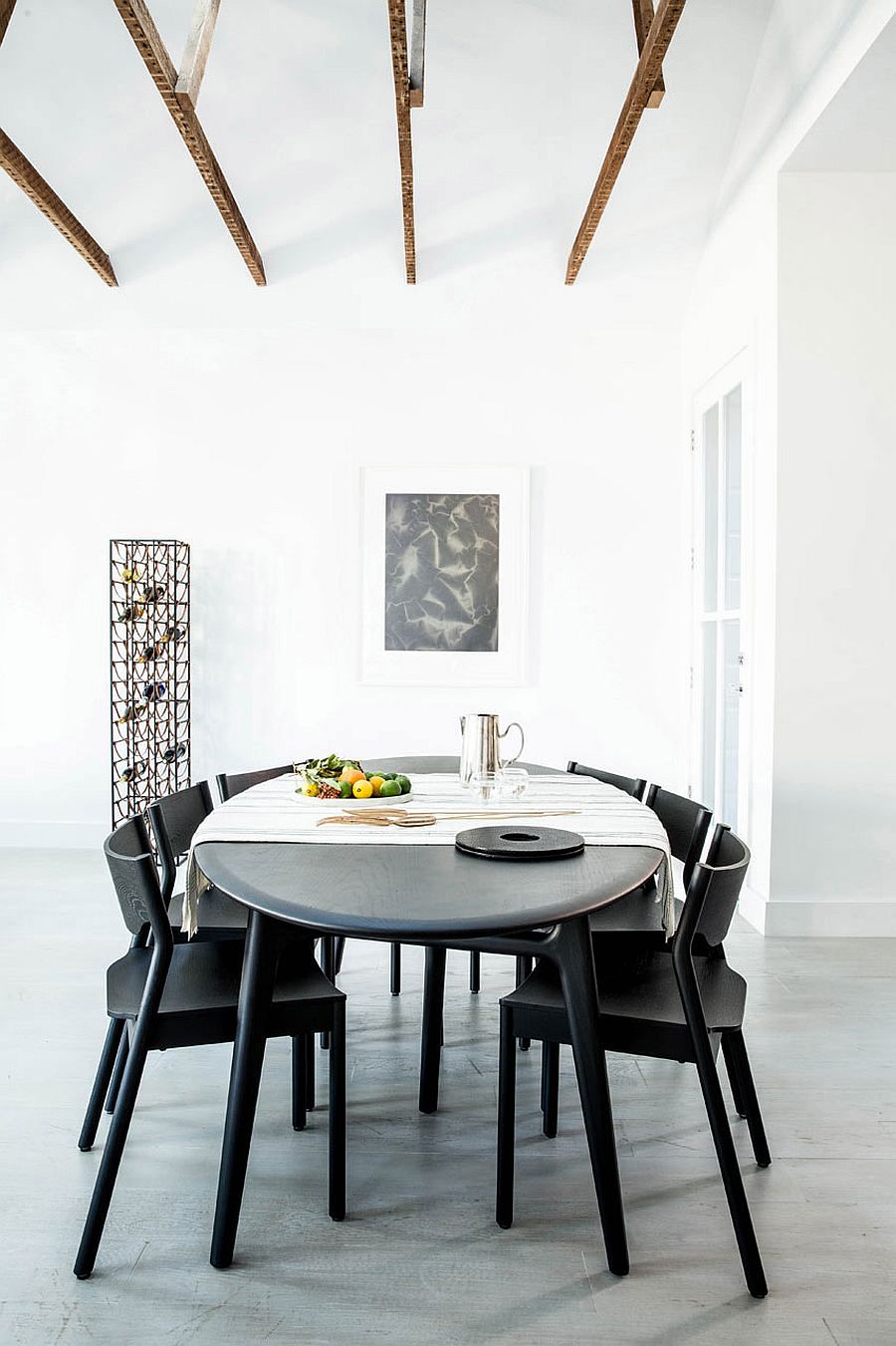 Stackable dining table chairs offer a versatile decorating arrangement inside the apartment