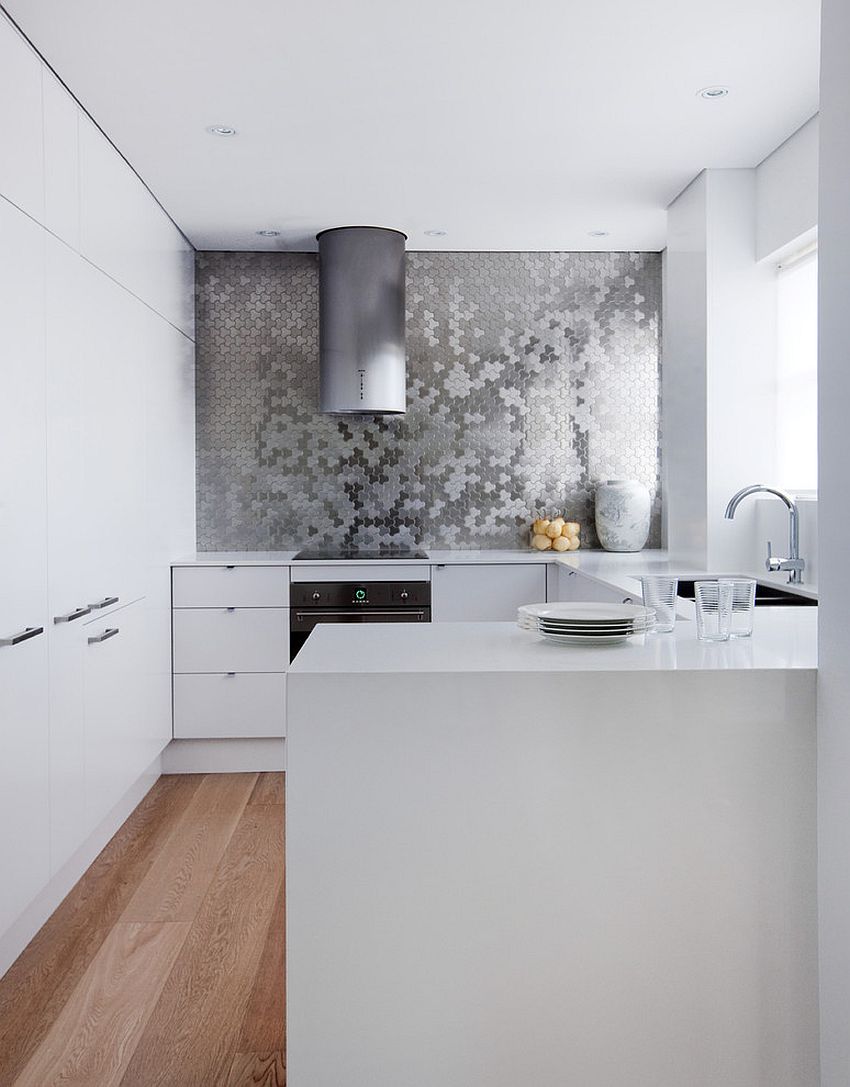Stunning backsplash in kitchen - Karim Rashid for ALLOY Ubiquity tile in Brushed Stainless Steel [Design: ALLOY Solid Metal Tiles]