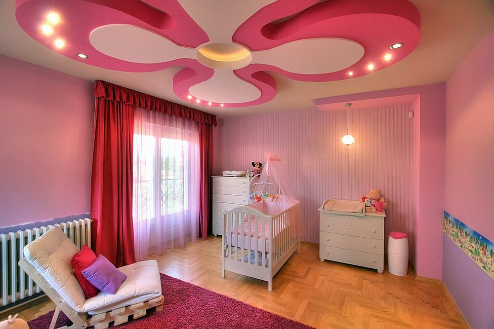 Stunning nursery in pink and purple with a ceiling design that is a showstopper [Design: Milan Vasic]