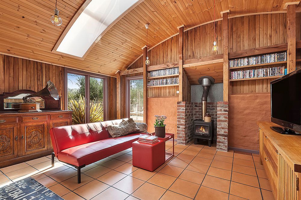 Sustainable interior with batten timber cladding and mud brick for the cozy family room