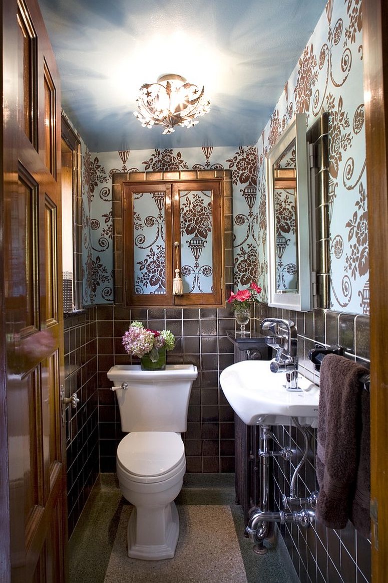 Tile, wallpaper and metallic dazzle come together in this tiny powder room [Design: Joni Spear Interior Design]