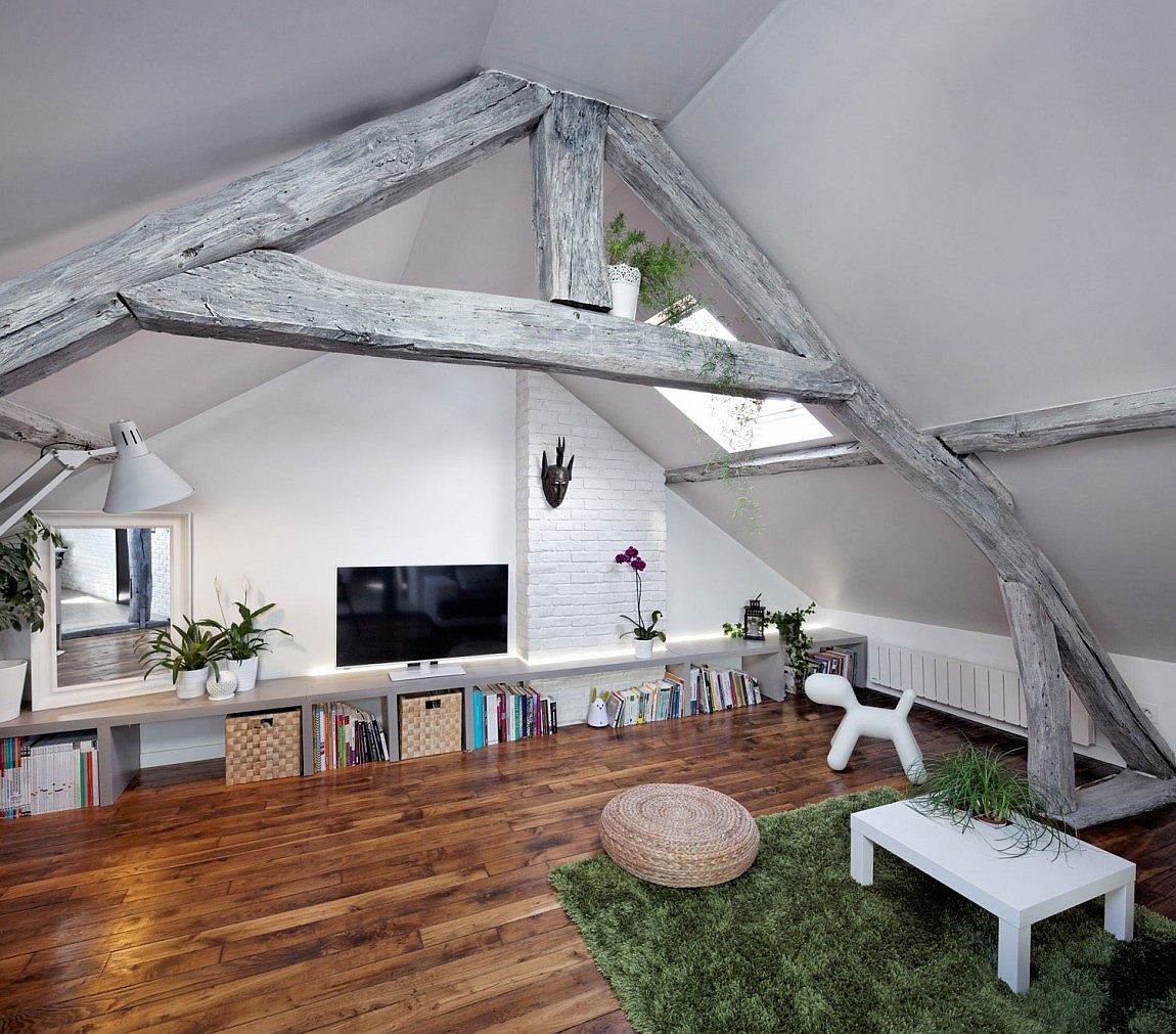 Timber beams and exposed brick wall sections combined with curated finishes inside the apartment