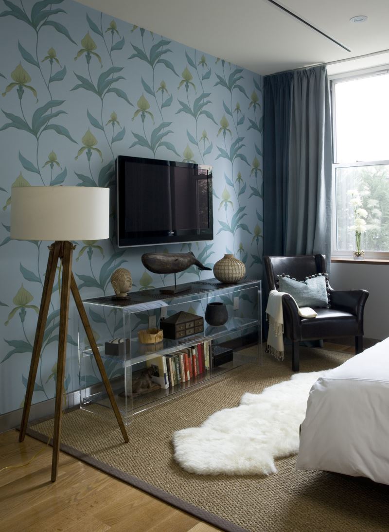 Wallpapered accent wall in a modern bedroom