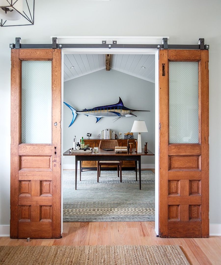 Beach style home office with sliding barn doors