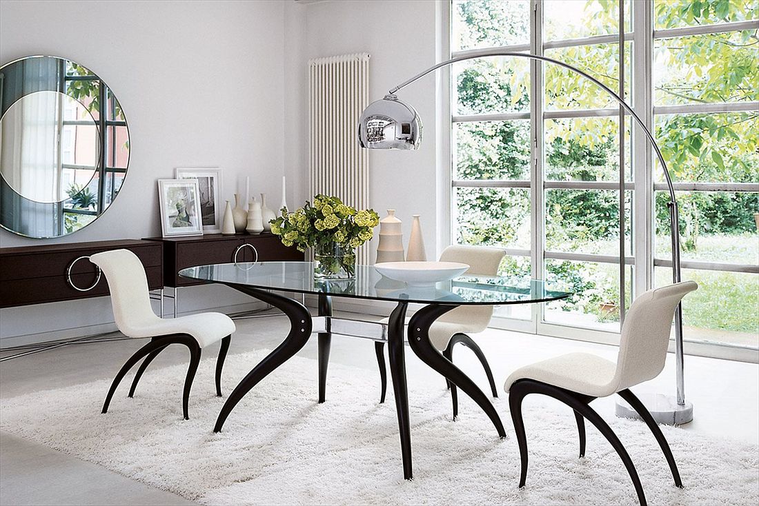 Beautiful dining table with distinct metal and wood base and glass top