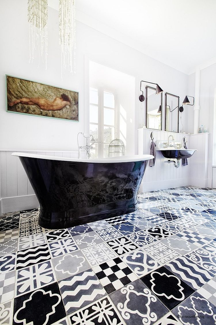 Black and white bathroom with a patchwork of patterned tiles [Design: carocim]