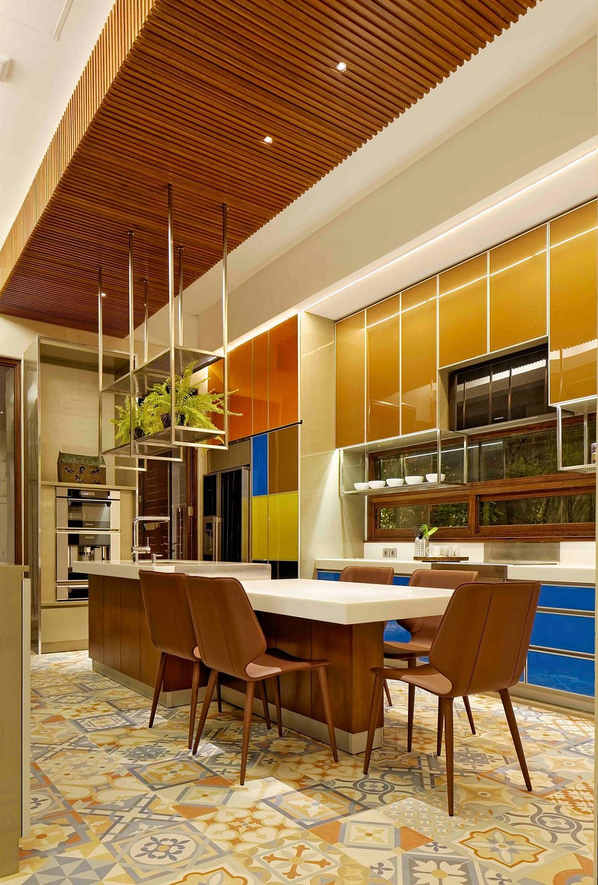 Blocks of color and an intricate ceiling create a fabulous dining room