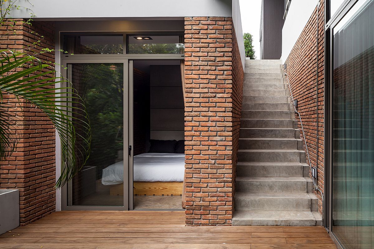 Brick walls bring industrial touch to the modern interior