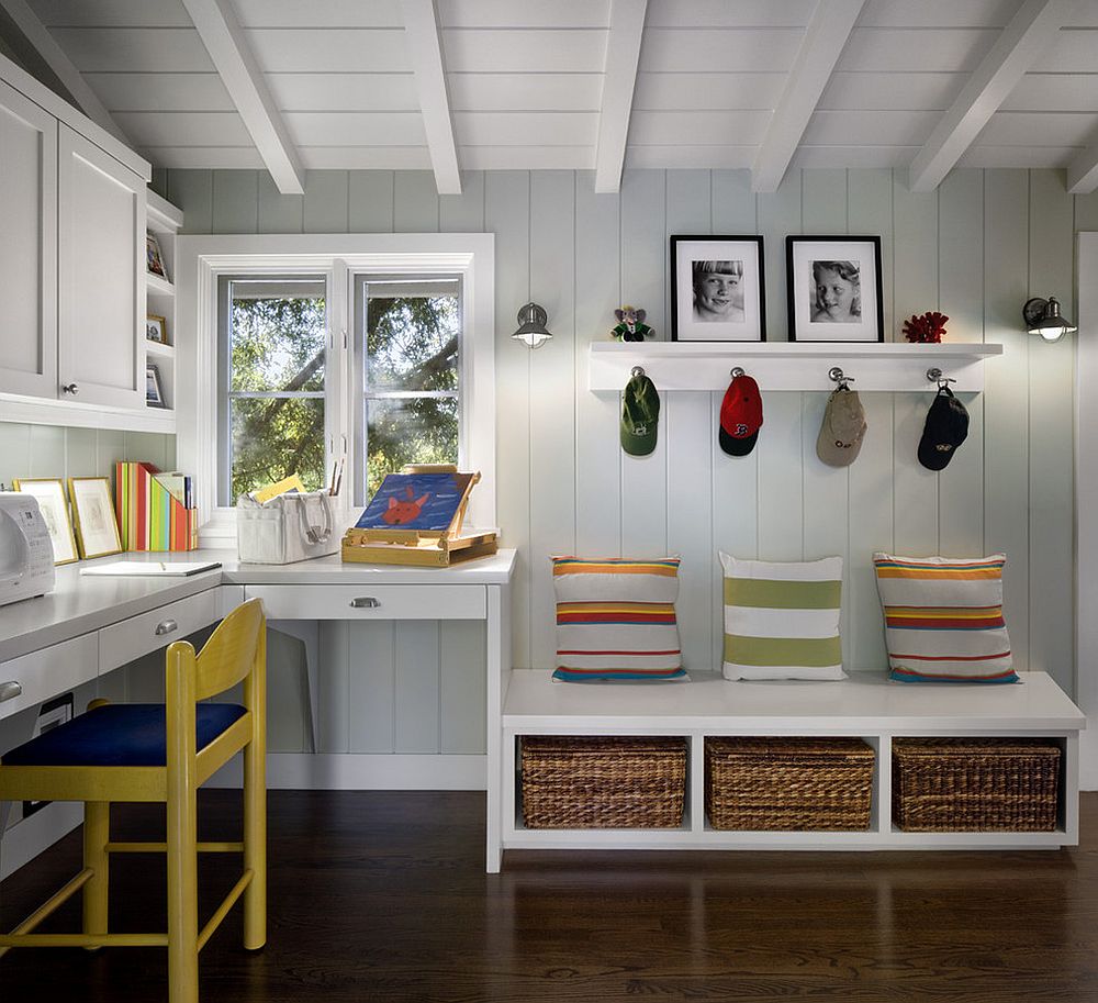 Bright pops of color in the mudroom seem even more attractive thanks to the gray backdrop [From: Ana Williamson Architect / David Wakely Photography]