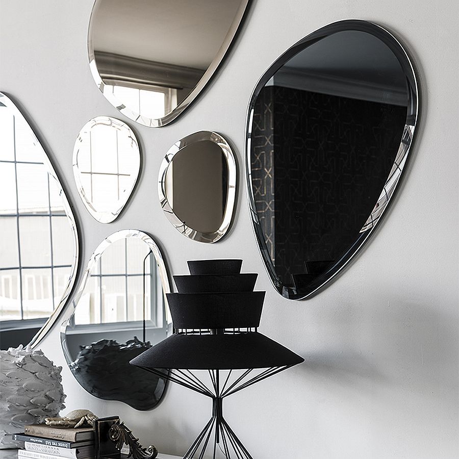 Charming mirrors create a lovely focal point in the room