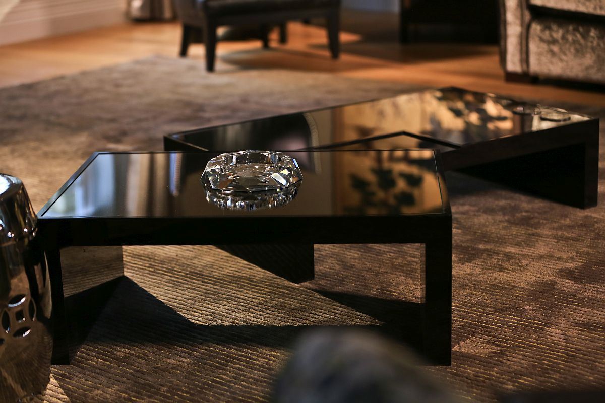 Coffee tables in black bring sophisticated glam to the living room