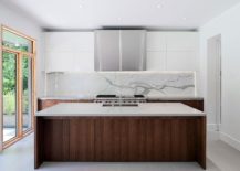 Contemporary-kitchen-in-white-with-wooden-lower-cabinets-island-and-a-marble-backsplash-217x155