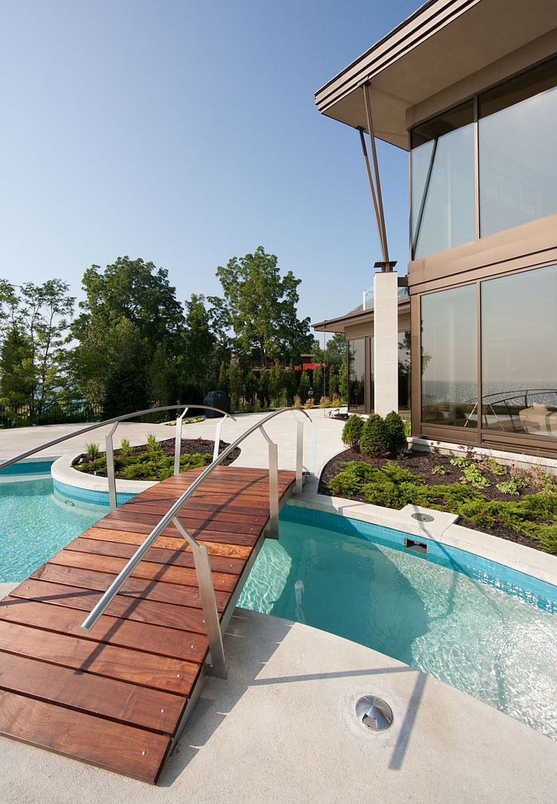 Contemporary pool with a cool wooden bridge [From: Christopher Simmonds Architect / Peter Fritz Photography]