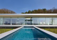 Contemporary-swimming-pool-with-solar-deck-at-exquisite-German-villa-217x155