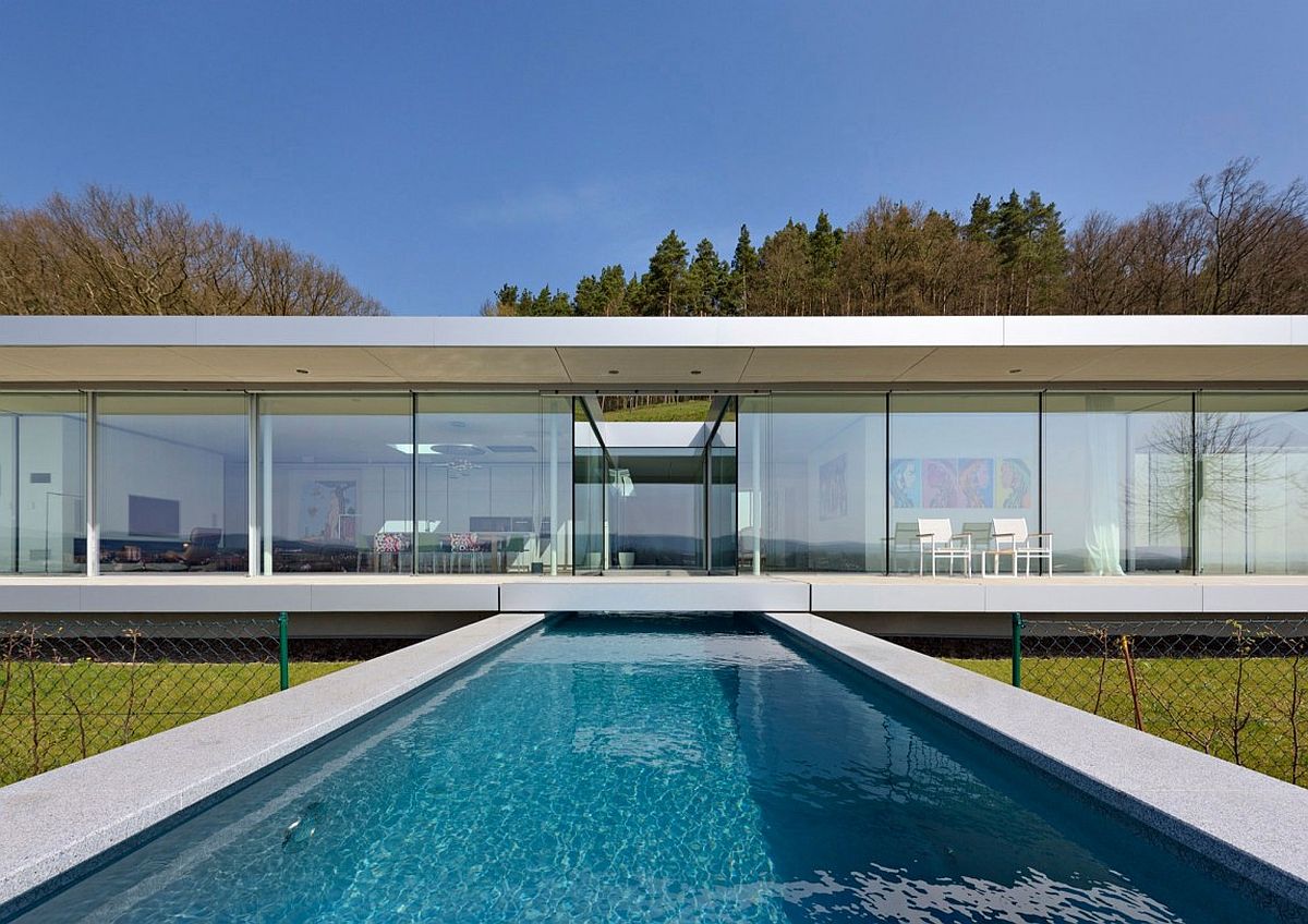 Contemporary swimming pool with solar deck at exquisite German villa