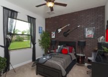 Cool-teen-bedroom-with-accent-brick-wall-and-guitar-on-the-walls-217x155