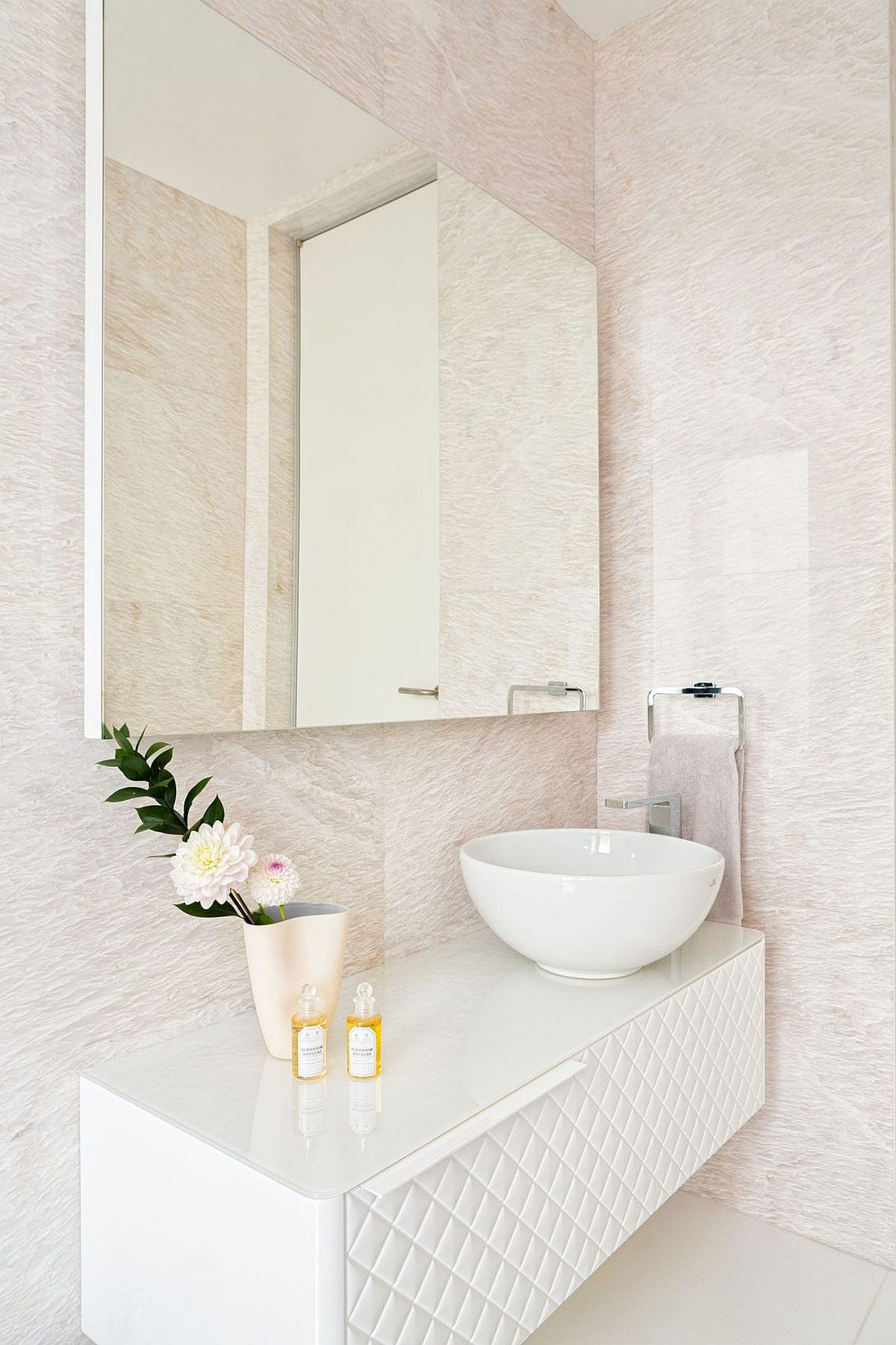 Custom floating vanity is both contemporary and glamarous