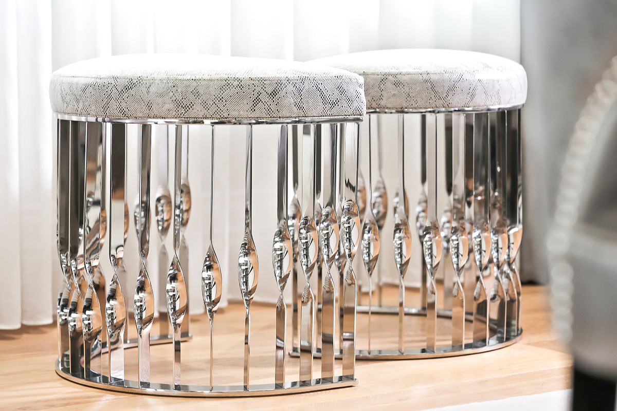 Custom upholstered  Mandy stools froom KOKET with stunning stainless steel finish