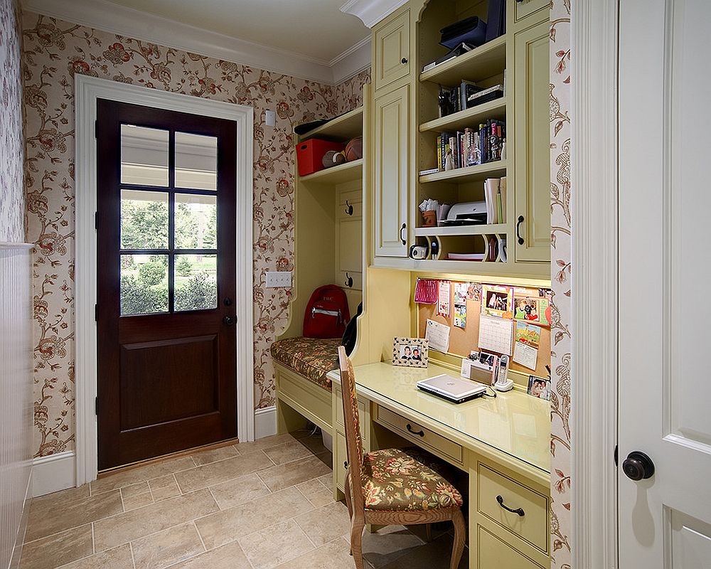 Even the tiniest entry can accommodate both the mudroom and home office [From: John C. Sanders and Company / Dustin Peck Photography]