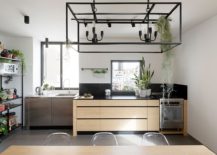 Gorgeous-kitchen-with-dark-marble-counters-and-ample-natural-light-217x155