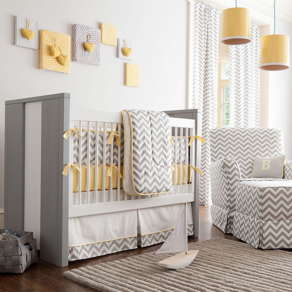 Gray and white chevron stripes coupled with pops of yellow in the contemporary nursery [Design: Carousel Designs]