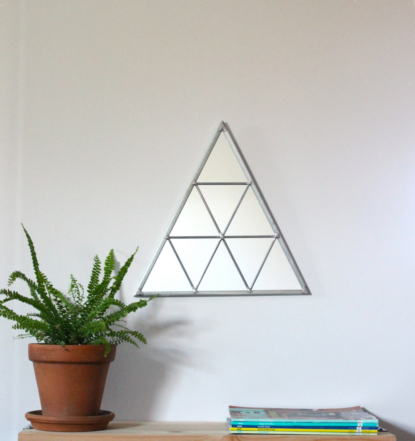 Handmade geometric wall mirror from Etsy shop Fluxglass