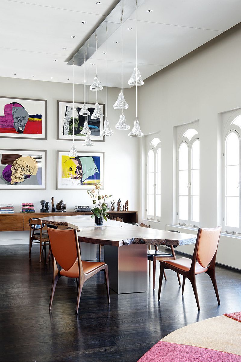 High ceiling, lovely windows and beautiful pendants give the dining room a cheerful ambiance