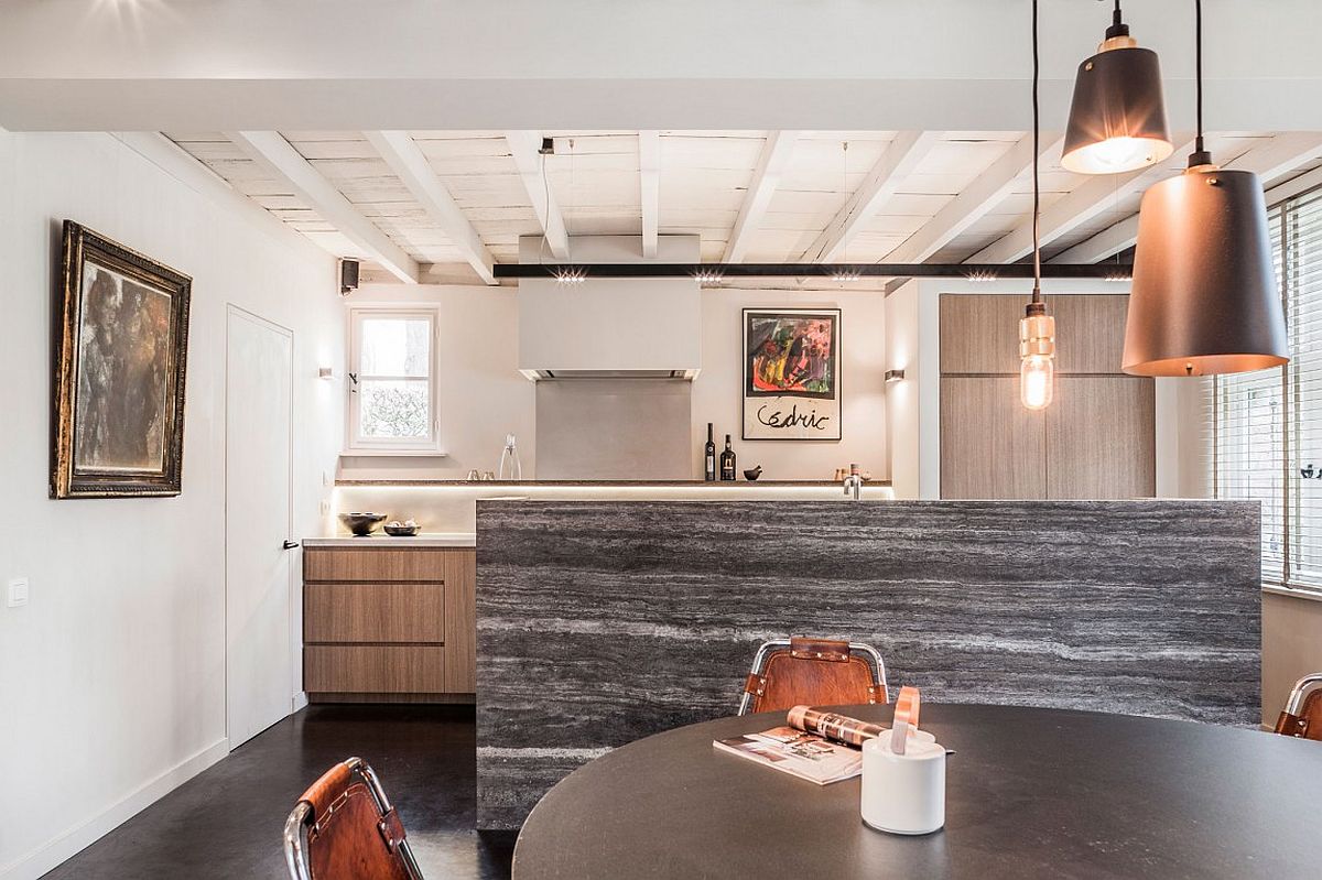 Impressive natural stone kitchen island inside the Belgian home