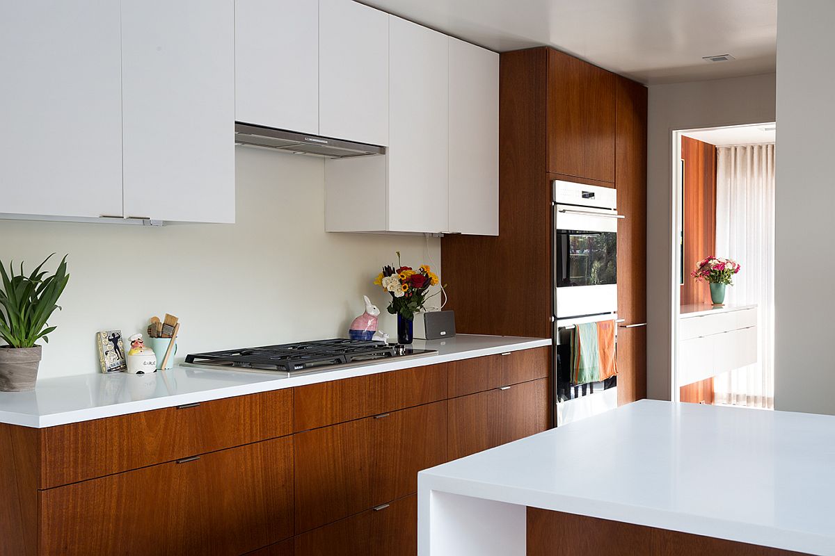 Kitchen with top cabinets in white, polished finish and mahogany finish for the lower cabinets