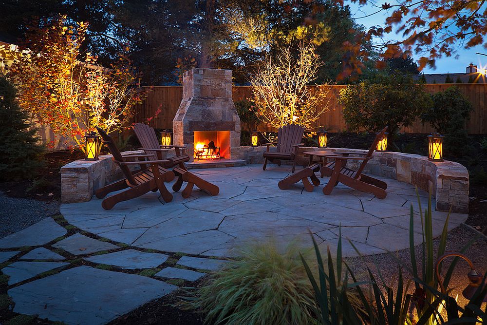 Lanterns and fireplace create a cozy and traditional outdoor hangout under the stars! [Design: beautiful bones and purple stones / Brian Lincoln Photography]