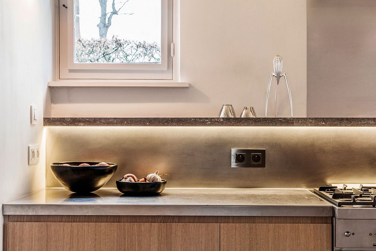 Lighting under the cabinets is both functional and aesthetic