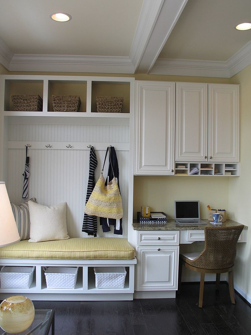 Making use of the small corner space in the tiny mudroom with smart seating [Design: Carlyn And Company Interiors + Design]