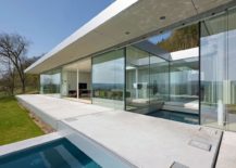 Modern-minimal-villa-in-Germany-where-the-pool-intersects-with-the-house-217x155