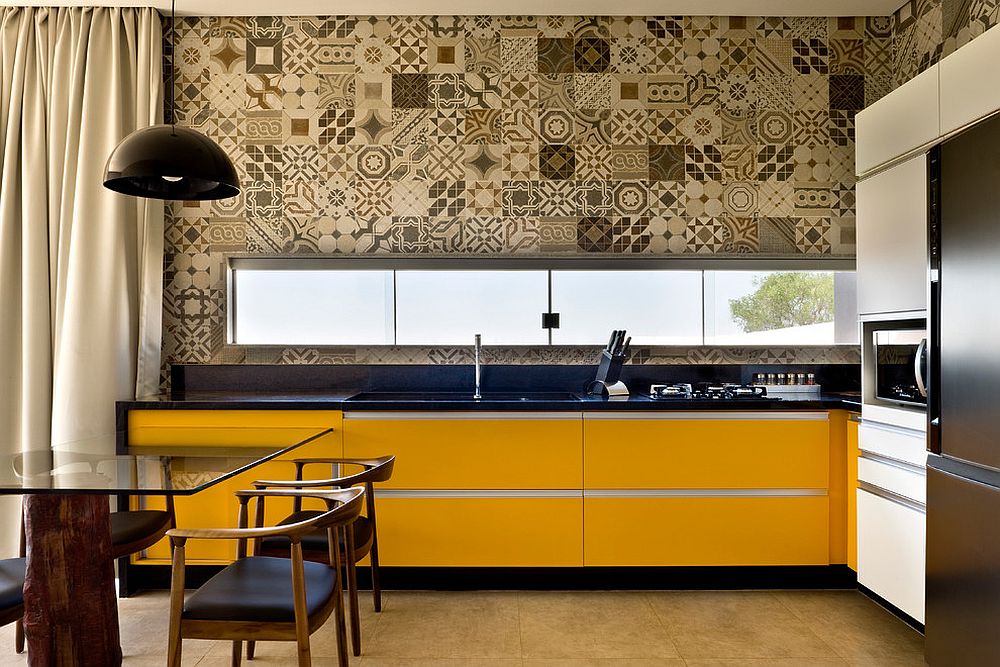 Monochromatic approach to patchwork of patterned tiles is great for the modern kitchen