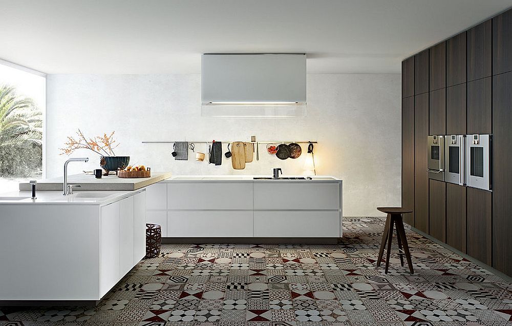 Monochromatic kitchen with patchwork tiled flooring