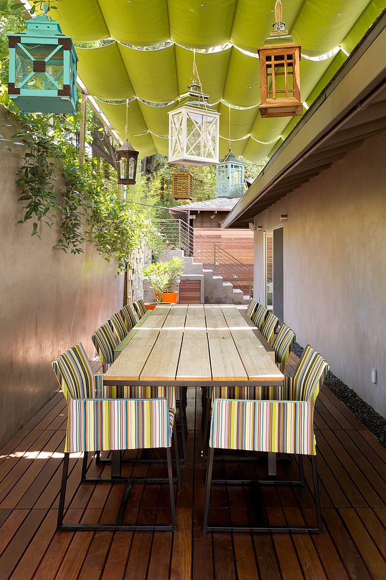 Multi-colored lanterns make a big statement in this narrow patio [Design: Go Green Construction]