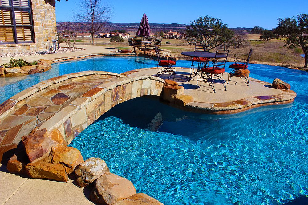 Nifty Bridge Over The Pool Leads To An Island Style Hangout At Its Center 