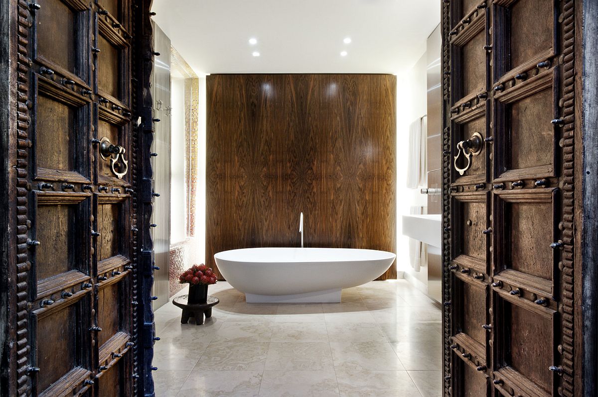 Oriental wooden doors and rich walnut wall for the contemporary bath