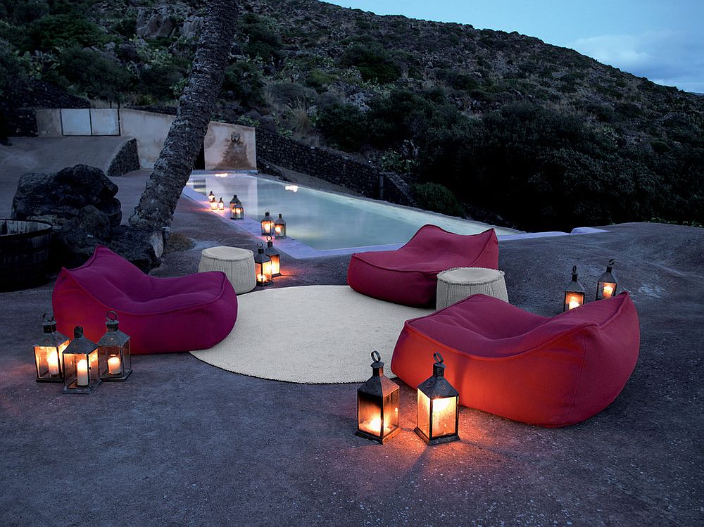 Outdoor lantern lighting next to the pool looks elegant and classic