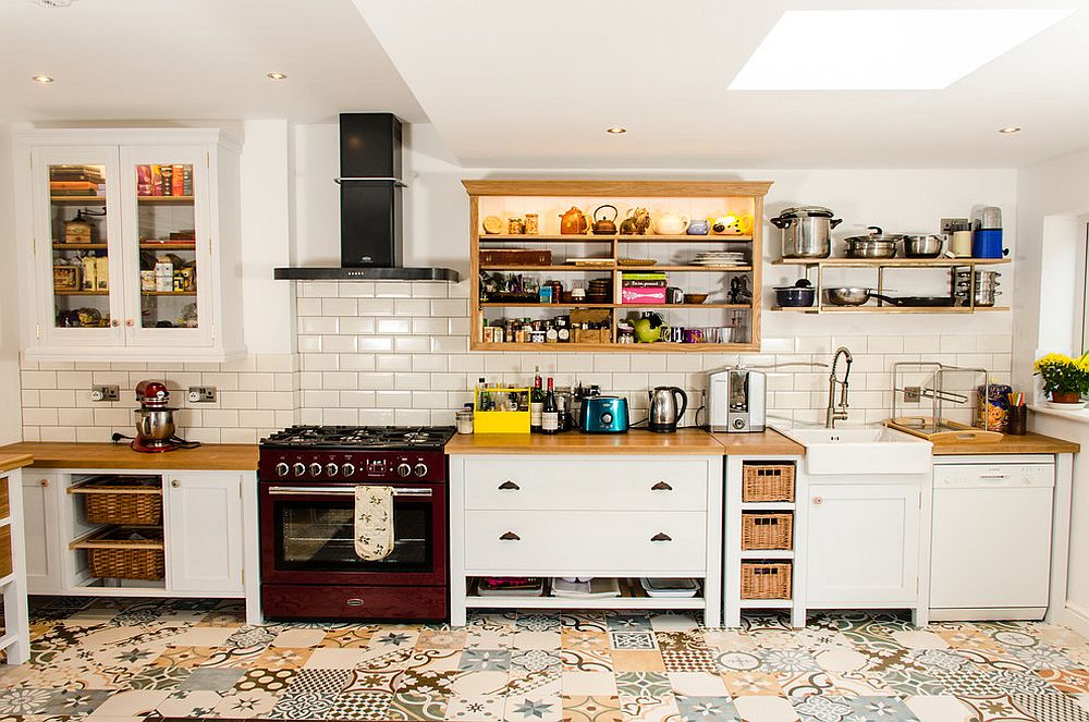 Patchwork of lovely tiles makes up the floor of this smart Farmhouse kitchen [Design: Clachan Wood]